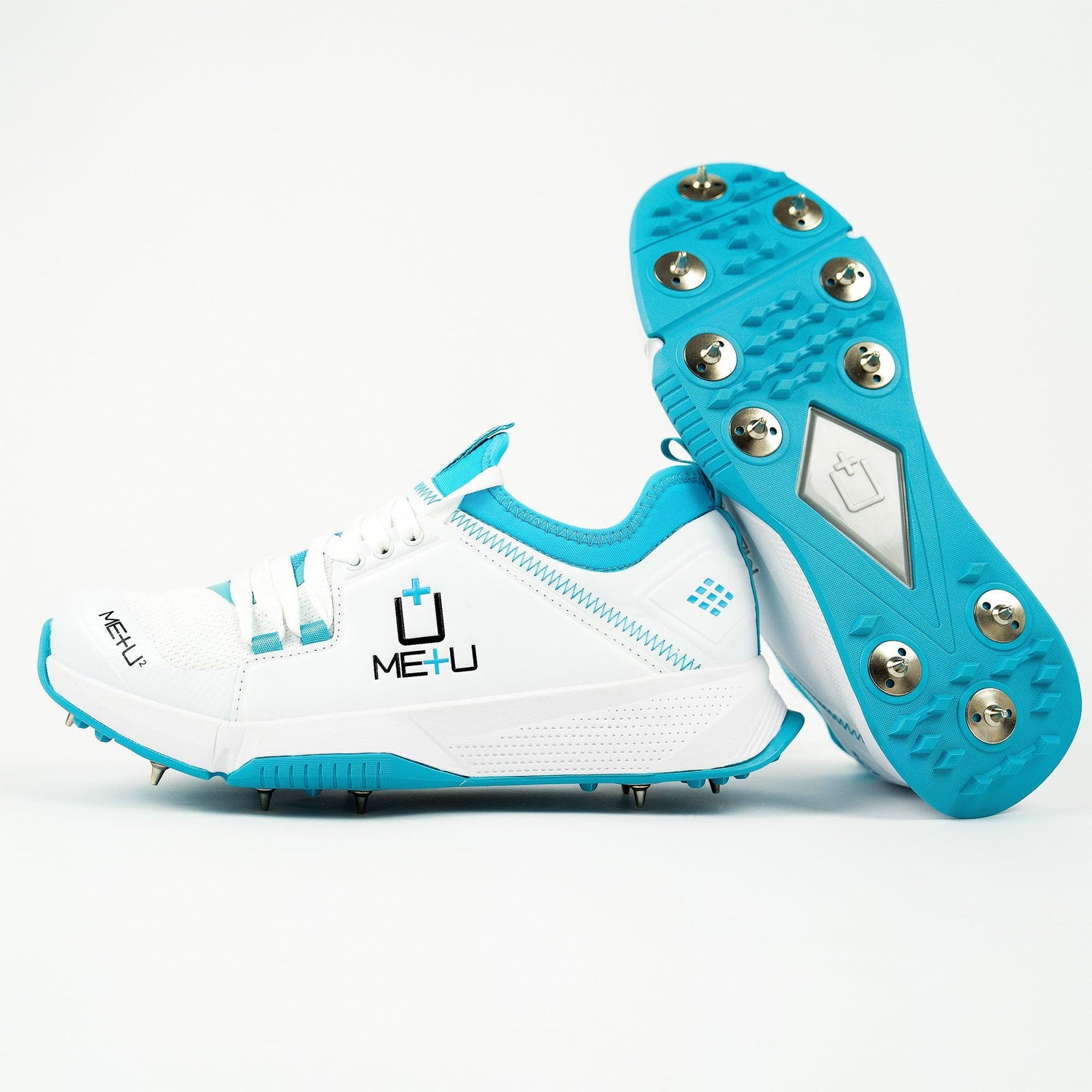 ME+U Mens All Rounder Cricket Shoes side profile  and stud detail with Blue Colours on white background