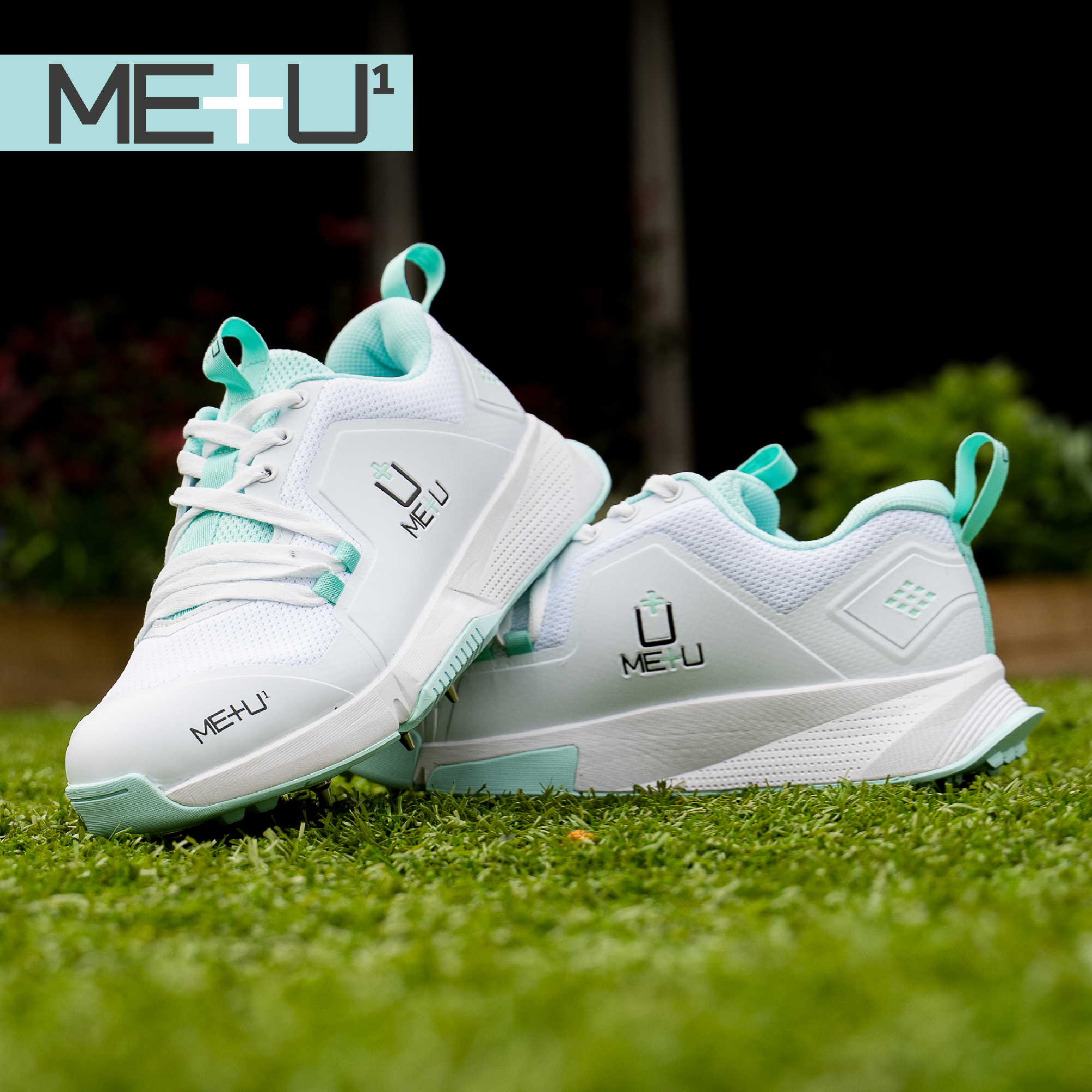 ME+U Womens Cricket Shoes with green trim on green grass